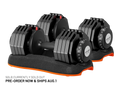 Two adjustable dumbbells in black and dark gray with orange accents, displayed on a matching black and orange stand against a white background. Text at the bottom reads '50LB CURRENTLY SOLD OUT PRE-ORDER NOW & SHIPS AUG.
