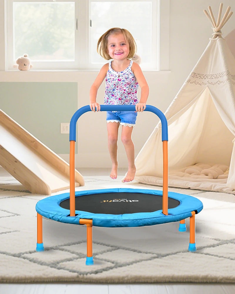 a little girl jumping on the mini trapoline