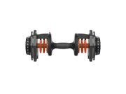 Top view of adjustable dumbbell with weight increments marked on dial for home gym
