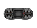 Side view of adjustable dumbbell showing weight plates and dial for fitness equipment