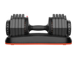 Front view of adjustable dumbbell with weight selector dial for weightlifting