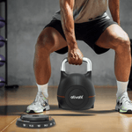 Man using Ativafit Adjustable Kettlebell 5-44 lbs in gym setting, demonstrating its versatility and compact design for strength training.