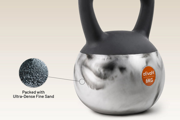 A 6KG kettlebell with a metallic silver body packed with fine sand, featuring a black handle and a circular orange sticker that reads 'activait 6KG'. An inset circle highlights the textured sand inside the body, with text reading 'Packed with Ultra-Dense Fine Sand'.
