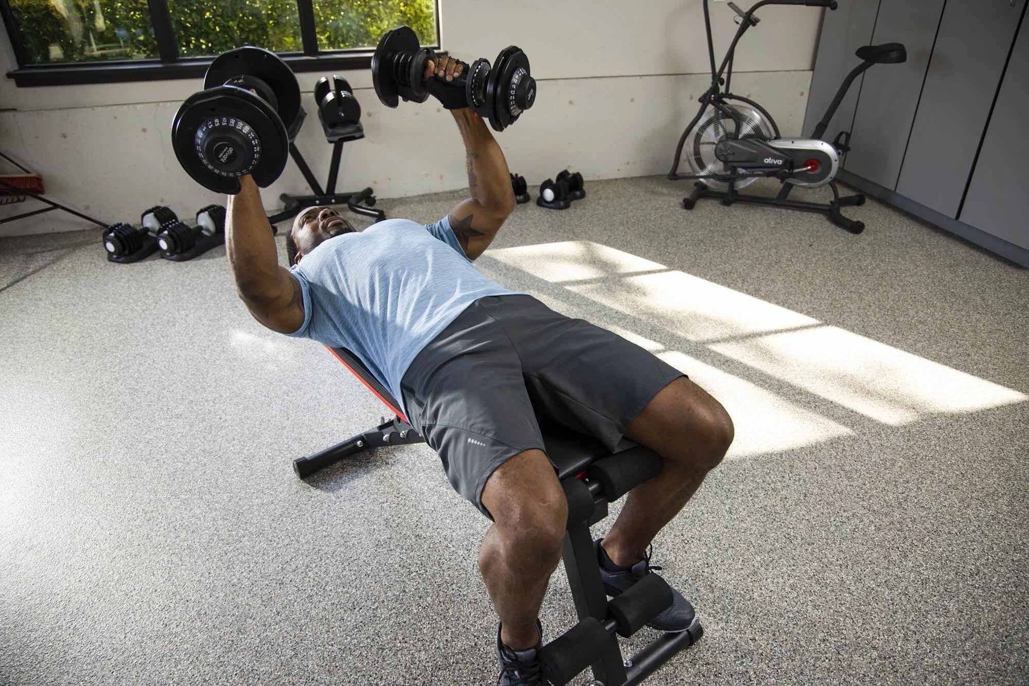 9 Weight Bench Dumbbell Exercises for Chest, Back, and Legs