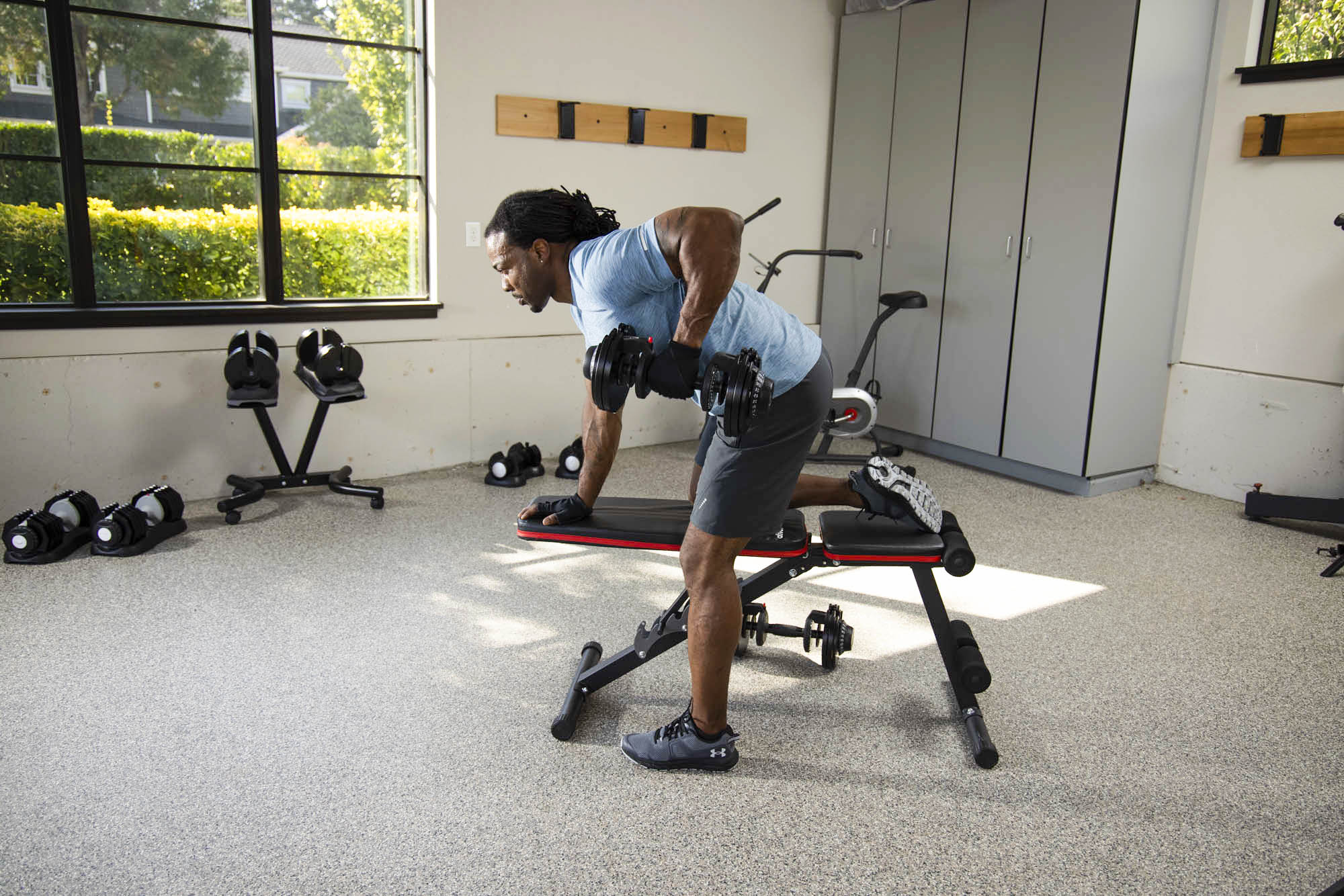 dumbbell rows on a bench