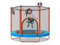 Child playing inside a  trampoline with basketball hoop and sports ball toys on a white background