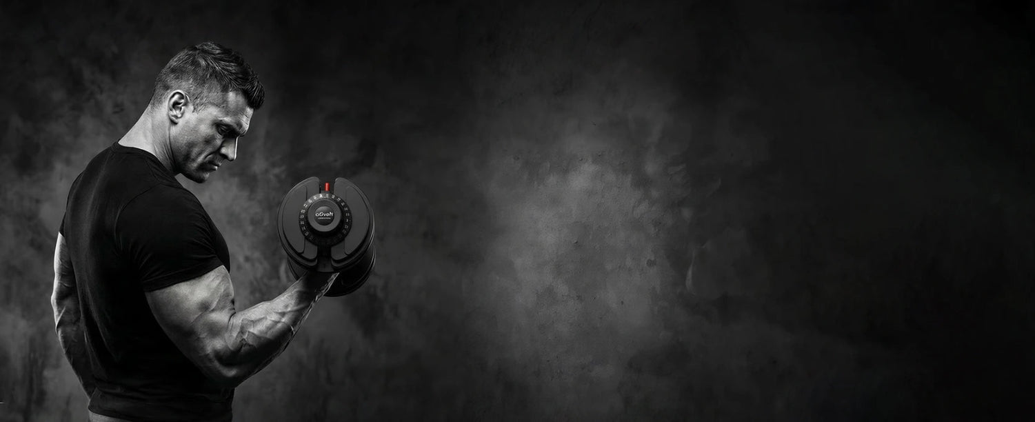 Man lifting a dumbbell against a dark background